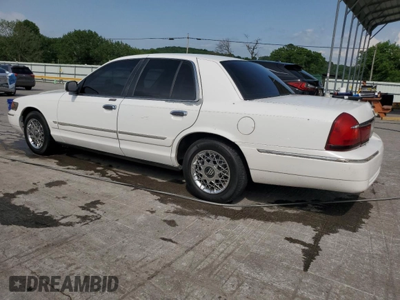 2000 Mercury Grand Marquis GS z VIN 2MEFM74WXYX699560, wystawiony jako Copart lot #57721925 z przebiegiem 246 297 mil mil oraz Szkoda całkowita • Salvage title. Historia ofert i sprzedaży dostępna na DreamBid. Obrazek 2.