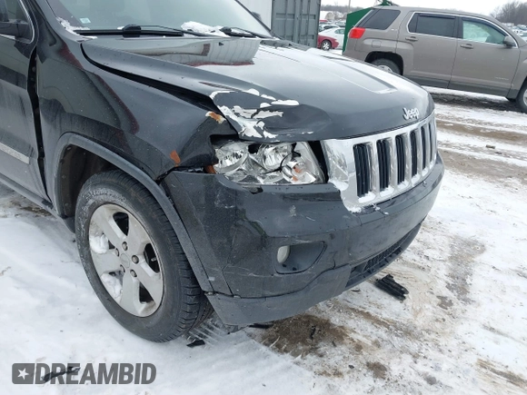 2011 Jeep Grand Cherokee 70th Anniversary with VIN 1J4RR4GG4BC519507, listed as a IAAI auction lot 41537091 with 175,967 mi miles. Bid and sale history available at carsss.com. Image 6.