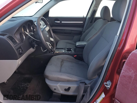 2010 Dodge Charger SXT with VIN 2B3CA3CVXAH125167, listed as a Copart auction lot 44458575 with 1,962,242 mi miles and Non Repairable. Bid and sale history available at DreamBid. Image 7.