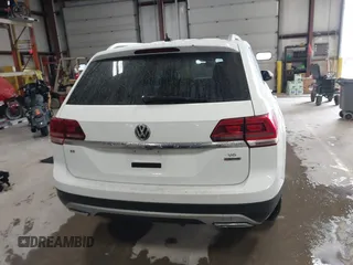 2018 Volkswagen Atlas SE with VIN 1V2KR2CA2JC569381, listed as a IAAI auction lot 41843200 with 87,769 mi miles and . Bid and sale history available at DreamBid. Image 16.