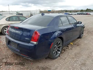 2015 Chrysler 300 with VIN 2C3CCABG8FH746757, listed as a IAAI auction lot 41911890 with 144,973 mi miles. Bid and sale history available at carsss.com. Image 4.