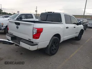 2020 Nissan Titan Platinum Reserve with VIN 1N6AA1EF8LN507009, listed as a IAAI auction lot 42480866 with 119,447 mi miles and . Bid and sale history available at DreamBid. Image 4.