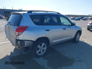 2006 Toyota RAV4 with VIN JTMBK33VX66000704, listed as a IAAI auction lot 41884109 with 256,711 mi miles. Bid and sale history available at carsss.com. Image 4.