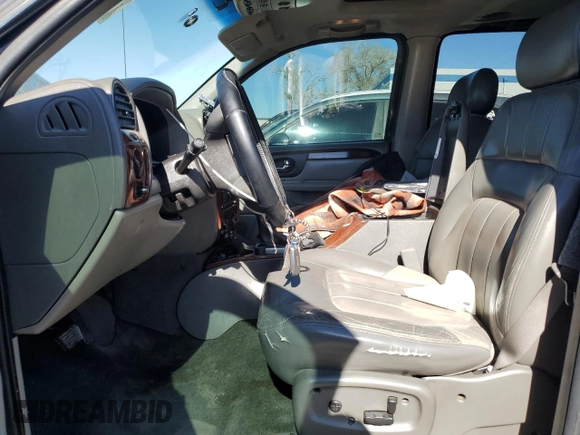 2003 GMC Envoy SLT z VIN 1GKET16S436169701, wystawiony jako Copart lot #44390805 z przebiegiem 168 236 mil mil oraz Szkoda całkowita • Salvage title. Historia ofert i sprzedaży dostępna na DreamBid. Obrazek 7.