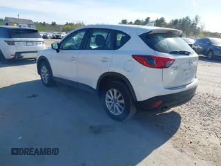 2015 Mazda CX-5 Sport with VIN JM3KE4BY3F0495511, listed as a IAAI auction lot 42170968 with 206,217 mi miles and . Bid and sale history available at carsss.com. Image 3.