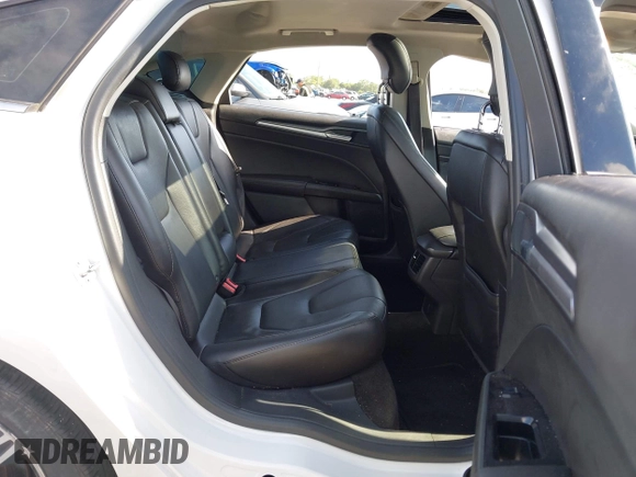 2014 Ford Fusion Titanium with VIN 3FA6P0K90ER172690, listed as a IAAI auction lot 42697162 with Not provided miles and . Bid and sale history available at DreamBid. Image 8.