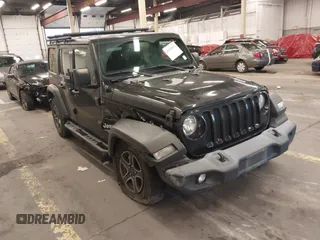 2020 Jeep Wrangler Unlimited Sport S z VIN 1C4HJXDG2LW193043, wystawiony jako IAAI lot #41189952 z przebiegiem 54 263 mil mil oraz . Historia ofert i sprzedaży dostępna na DreamBid. Obrazek 1.