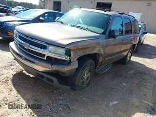 2004 Chevrolet Tahoe LS with VIN 1GNEK13Z34R304352, listed as a IAAI auction lot 41565612 with 291,777 mi miles. Bid and sale history available at carsss.com. Image 2.
