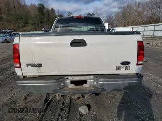 1999 Ford F-250 with VIN 1FTRX27L9XKA27324, listed as a Copart auction lot 87019484 with 152,787 mi miles and Salvage title. Bid and sale history available at DreamBid. Image 6.