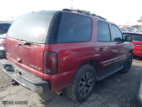2003 Chevrolet Tahoe LT with VIN 1GNEC13ZX3R307650, listed as a IAAI auction lot 41292769 with 313,720 mi miles. Bid and sale history available at carsss.com. Image 4.