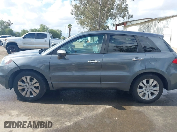 2012 Acura RDX Tech Pkg with VIN 5J8TB2H58CA002131, listed as a IAAI auction lot 41880892 with 140,115 mi miles. Bid and sale history available at carsss.com. Image 14.