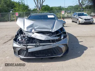 2025 Toyota Camry LE with VIN 4T1DAACK5SU539156, listed as a IAAI auction lot 42054268 with 5,705 mi miles and . Bid and sale history available at DreamBid. Image 13.