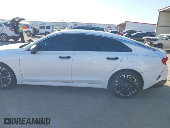 2022 Kia K5 GT-Line z VIN 5XXG64J23NG089623, wystawiony jako IAAI lot #41291422 z przebiegiem 128 273 mil mil oraz . Historia ofert i sprzedaży dostępna na DreamBid. Obrazek 14.