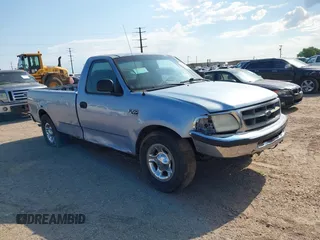 1998 Ford F-150 with VIN 1FTZF1760WKB31853, listed as a IAAI auction lot 42595285 with 303,186 mi miles and . Bid and sale history available at DreamBid. Image 1.