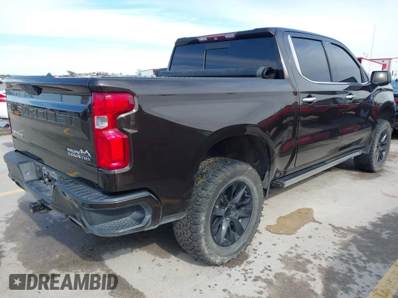 2019 Chevrolet Silverado 1500 High Country with VIN 1GCUYHELXKZ323675, listed as a IAAI auction lot 41296454 with 102,107 mi miles. Bid and sale history available at carsss.com. Image 4.