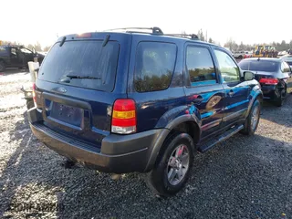 2004 Ford Escape XLT with VIN 1FMYU03134KA30806, listed as a IAAI auction lot 41449933 with 137,897 mi miles. Bid and sale history available at carsss.com. Image 4.