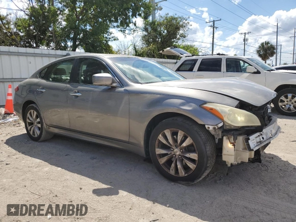 2011 Infiniti M37 with VIN JN1BY1AR9BM370205, listed as a Copart auction lot 73017334 with 166,301 mi miles and Salvage Title. Bid and sale history available at carsss.com. Image 4.