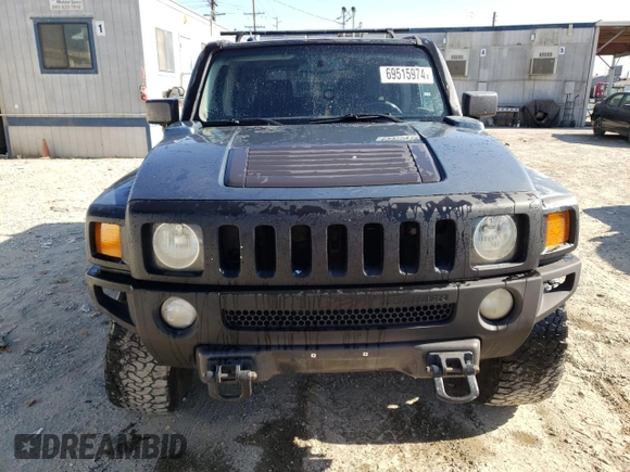 2007 Hummer H3 SUV with VIN 5GTDN13E378129872, listed as a Copart auction lot 69515974 with 166,803 mi miles and Salvage Title. Bid and sale history available at carsss.com. Image 5.