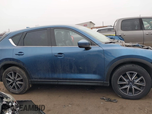 2017 Mazda CX-5 Grand Touring with VIN JM3KFADL9H0187338, listed as a IAAI auction lot 41382034 with 141,972 mi miles and . Bid and sale history available at carsss.com. Image 14.