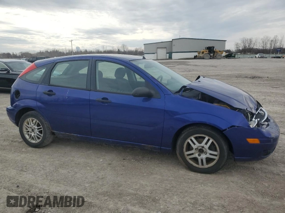 2005 Ford Focus S with VIN 3FAFP37N85R101955, listed as a Copart auction lot 53199895 with 135,984 mi miles and Salvage Title. Bid and sale history available at carsss.com. Image 4.
