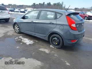 2012 Hyundai Accent SE with VIN KMHCU5AE4CU037411, listed as a IAAI auction lot 41659662 with 163,021 mi miles. Bid and sale history available at carsss.com. Image 3.