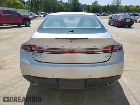 2013 Lincoln MKZ z VIN 3LN6L2GK5DR803943, wystawiony jako Copart lot #51714625 z przebiegiem 108 958 mil mil oraz Szkoda całkowita • Salvage title. Historia ofert i sprzedaży dostępna na DreamBid. Obrazek 6.