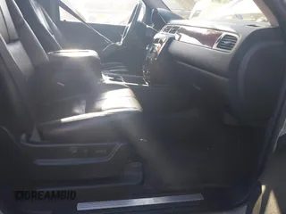 2007 Chevrolet Tahoe LTZ z VIN 1GNFK130X7J298560, wystawiony jako IAAI lot #42127703 z przebiegiem 268 095 mil mil oraz . Historia ofert i sprzedaży dostępna na DreamBid. Obrazek 5.