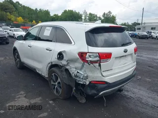 2017 Kia Sorento EX with VIN 5XYPHDA55HG336810, listed as a IAAI auction lot 39946463 with 129,876 mi miles and . Bid and sale history available at carsss.com. Image 3.