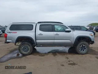 2017 Toyota Tacoma SR5 with VIN 3TMCZ5AN8HM051829, listed as a IAAI auction lot 41616329 with 64,113 mi miles and . Bid and sale history available at DreamBid. Image 13.