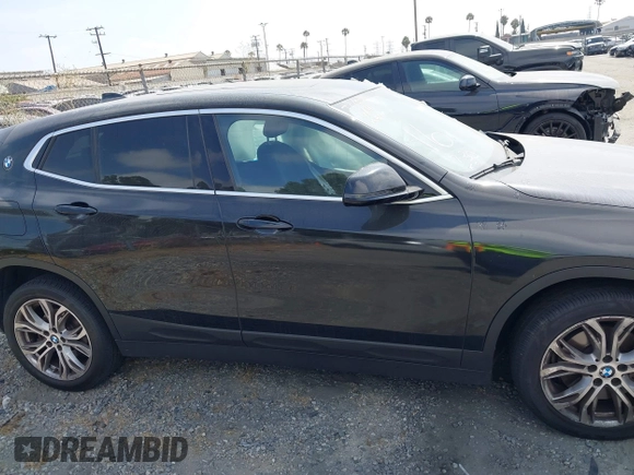 2019 BMW X2 sDrive28i with VIN WBXYJ3C58KEP77334, listed as a IAAI auction lot 42575165 with 98,910 mi miles and . Bid and sale history available at DreamBid. Image 13.