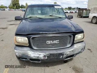 1999 GMC Denali z VIN 1GKEK13R1XR917376, wystawiony jako Copart lot #64991924 z przebiegiem 247 231 mil mil oraz Tytuł czysty. Historia ofert i sprzedaży dostępna na DreamBid. Obrazek 5.