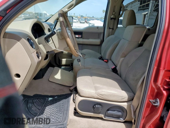 2007 Ford F-150 XLT with VIN 1FTRW12W97KC85972, listed as a Copart auction lot 61775655 with 103,406 mi miles and Salvage title. Bid and sale history available at DreamBid. Image 7.