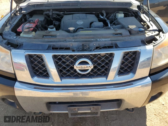 2014 Nissan Titan Pro-4X with VIN 1N6AA0EC2EN519983, listed as a Copart auction lot 71496934 with 150,259 mi miles and Salvage title. Bid and sale history available at DreamBid. Image 11.