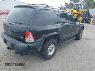 1999 Dodge Durango z VIN 1B4HS28Y2XF601465, wystawiony jako IAAI lot #41686754 z przebiegiem 168 550 mil mil oraz . Historia ofert i sprzedaży dostępna na DreamBid. Obrazek 4.