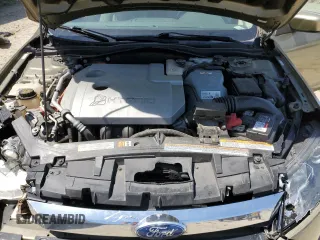 2012 Ford Fusion Hybrid with VIN 3FADP0L3XCR267935, listed as a Copart auction lot 54770805 with 144,794 mi miles and Salvage title. Bid and sale history available at DreamBid. Image 11.