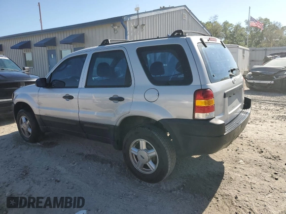 2002 Ford Escape XLS Choice with VIN 1FMYU01142KD48997, listed as a Copart auction lot 53340815 with 172,235 mi miles and Salvage title. Bid and sale history available at DreamBid. Image 2.