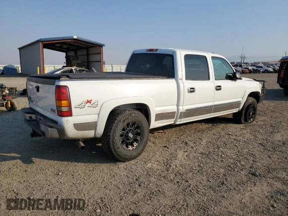 2003 GMC Sierra 1500HD SLT z VIN 1GTGK13U53F217669, wystawiony jako Copart lot #74547254 z przebiegiem 204 966 mil mil oraz Czysty tytuł • Clean title. Historia ofert i sprzedaży dostępna na DreamBid. Obrazek 3.