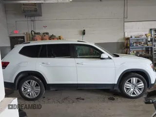 2019 Volkswagen Atlas SE z VIN 1V2UR2CA2KC545740, wystawiony jako IAAI lot #41968203 z przebiegiem 78 080 mil mil oraz . Historia ofert i sprzedaży dostępna na DreamBid. Obrazek 14.