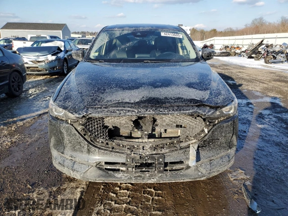 2017 Mazda CX-5 Touring with VIN JM3KFBCL0H0148970, listed as a Copart auction lot 42413605 with 57,776 mi miles and Salvage Title. Bid and sale history available at carsss.com. Image 5.