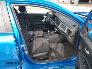 2023 Kia Rio S with VIN 3KPA25AD4PE558982, listed as a IAAI auction lot 41338270 with 40,965 mi miles and . Bid and sale history available at DreamBid. Image 5.