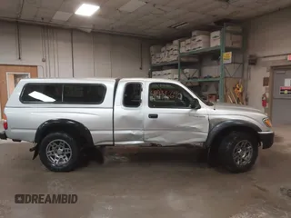 2004 Toyota Tacoma z VIN 5TEWN72N84Z399274, wystawiony jako IAAI lot #41936690 z przebiegiem 322 181 mil mil oraz . Historia ofert i sprzedaży dostępna na DreamBid. Obrazek 13.