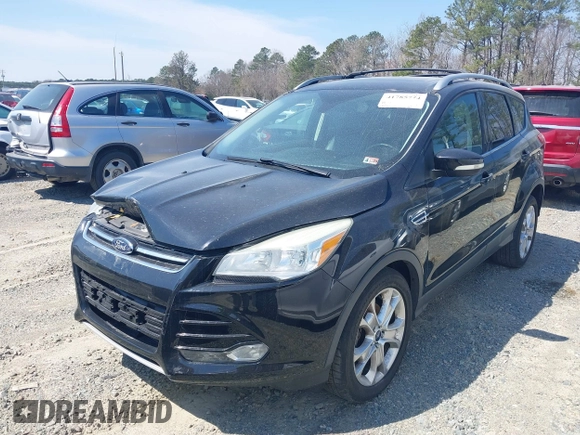 2016 Ford Escape Titanium with VIN 1FMCU0JX8GUC06601, listed as a IAAI auction lot 41785774 with 121,427 mi miles. Bid and sale history available at carsss.com. Image 17.