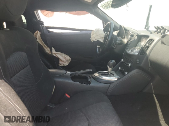 2016 Nissan 370Z Sport с VIN JN1AZ4EH9GM934860, выставлен на аукционе Copart как лот 54613555 с пробегом Не указан миль и Чистый • Clean title. История ставок и продаж доступна на DreamBid. Изображение 7.