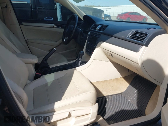 2015 Volkswagen Passat 1.8T Limited Edition with VIN 1VWAT7A36FC118099, listed as a IAAI auction lot 41919223 with 103,916 mi miles. Bid and sale history available at carsss.com. Image 5.