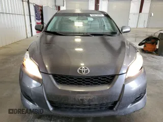 2009 Toyota Matrix S with VIN 2T1LE40E79C011596, listed as a Copart auction lot 60873695 with 207,692 mi miles and Salvage title. Bid and sale history available at DreamBid. Image 5.