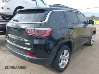 2018 Jeep Compass Altitude with VIN 3C4NJDBB0JT484409, listed as a IAAI auction lot 41656179 with 85,436 mi miles and . Bid and sale history available at carsss.com. Image 4.