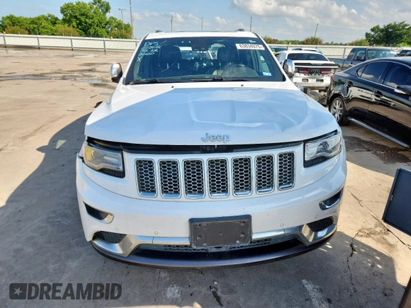 2014 Jeep Grand Cherokee Summit with VIN 1C4RJFJG9EC338666, listed as a Copart auction lot 63834075 with 196,840 mi miles and Salvage title. Bid and sale history available at DreamBid. Image 5.