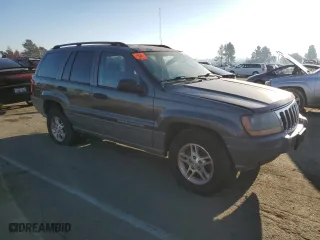 2002 Jeep Grand Cherokee Laredo with VIN 1J4GW48N32C200645, listed as a Copart auction lot 88174715 with 112,129 mi miles and Clean Title. Bid and sale history available at carsss.com. Image 4.