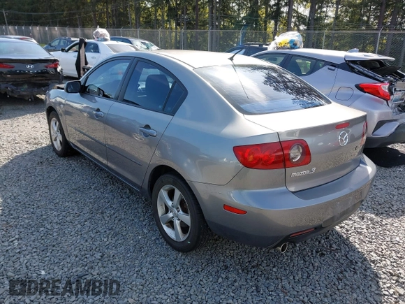 2006 Mazda 3 i with VIN JM1BK12F461530369, listed as a IAAI auction lot 41990008 with 169,878 mi miles. Bid and sale history available at carsss.com. Image 3.