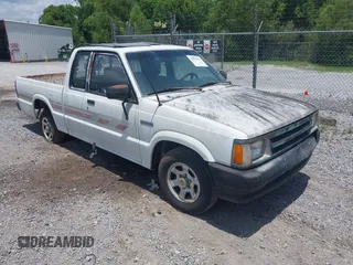 1991 Mazda B-Series Truck z VIN JM2UF3133M0169084, wystawiony jako IAAI lot #42511871 z przebiegiem 175 426 mil mil oraz . Historia ofert i sprzedaży dostępna na DreamBid. Obrazek 1.